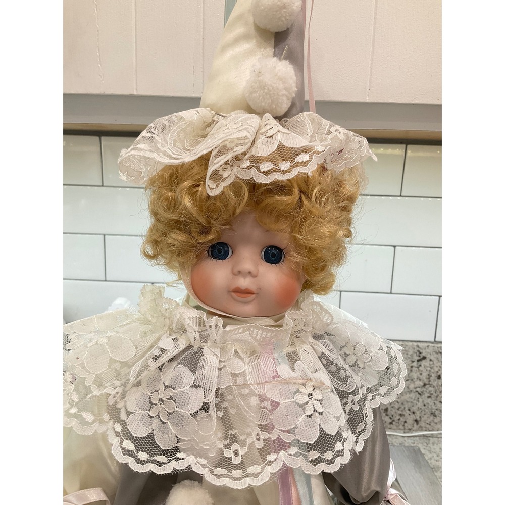 VINTAGE PORCELAIN DOLL IN CLOWN COSTUME